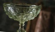 A similar pressed-glass compote.